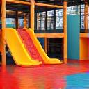 Brightly colored children's soft play area.